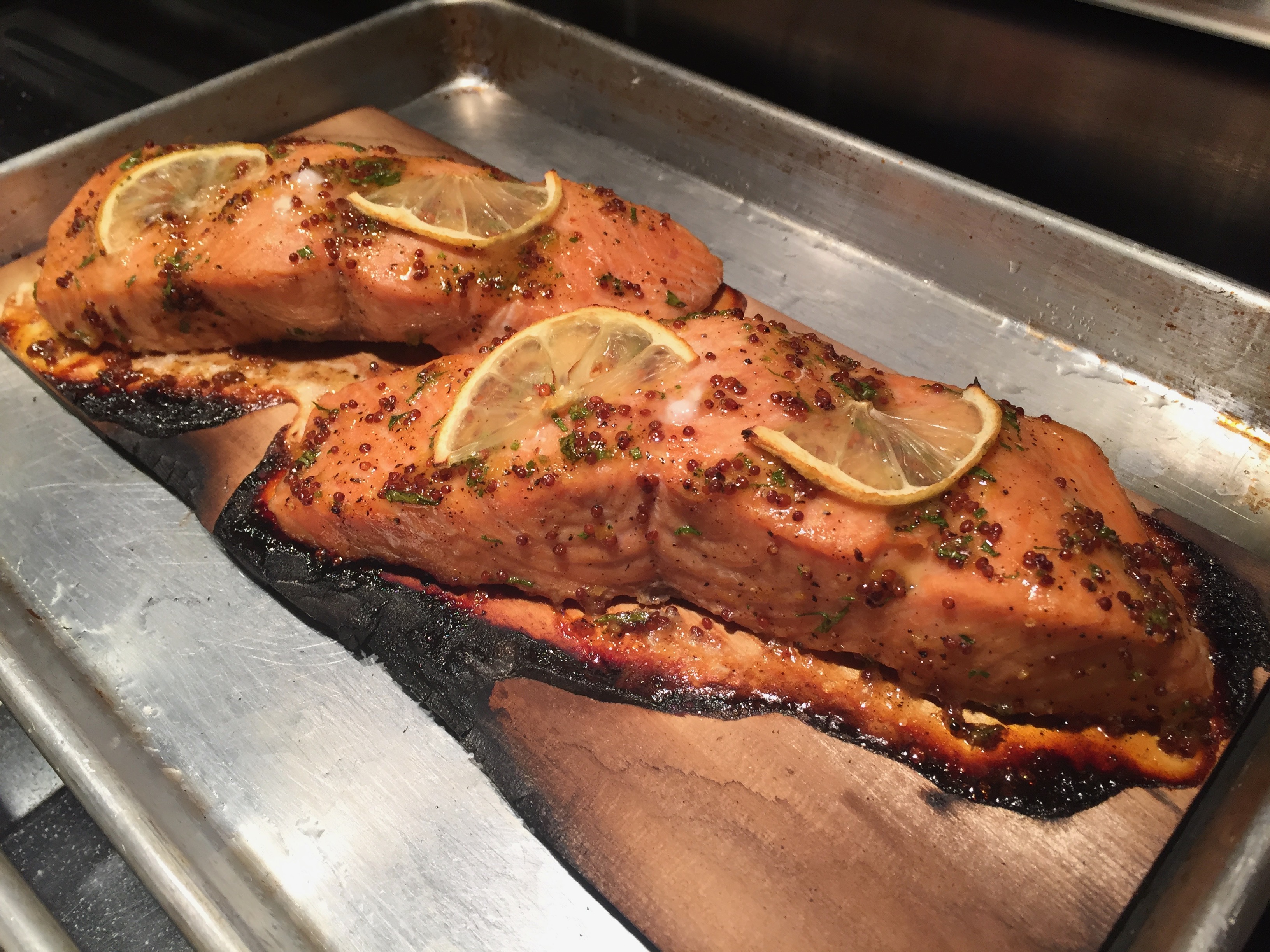 cooked salmon on cedar plank